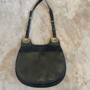 Louise et Cie handbag.  Black leather with gold hardware